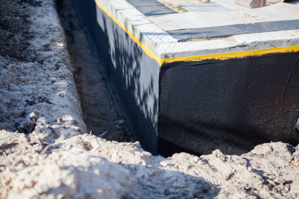 Professional Waterproofing technician working in Hamburg, PA